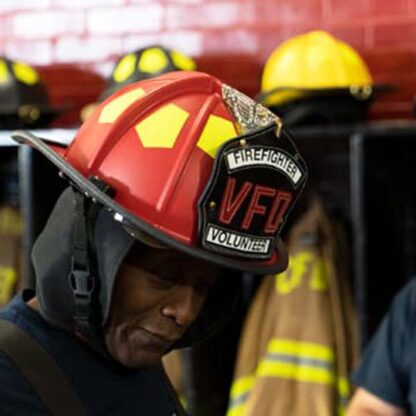 red helmet on firefighter
